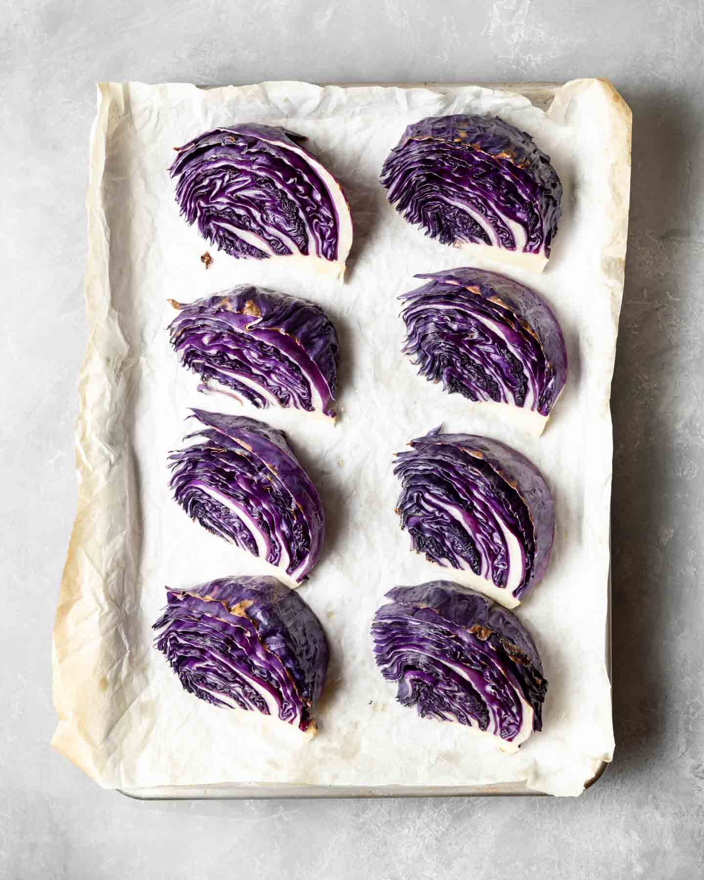 Roasted Red Cabbage on a baking sheet, fresh from the oven.