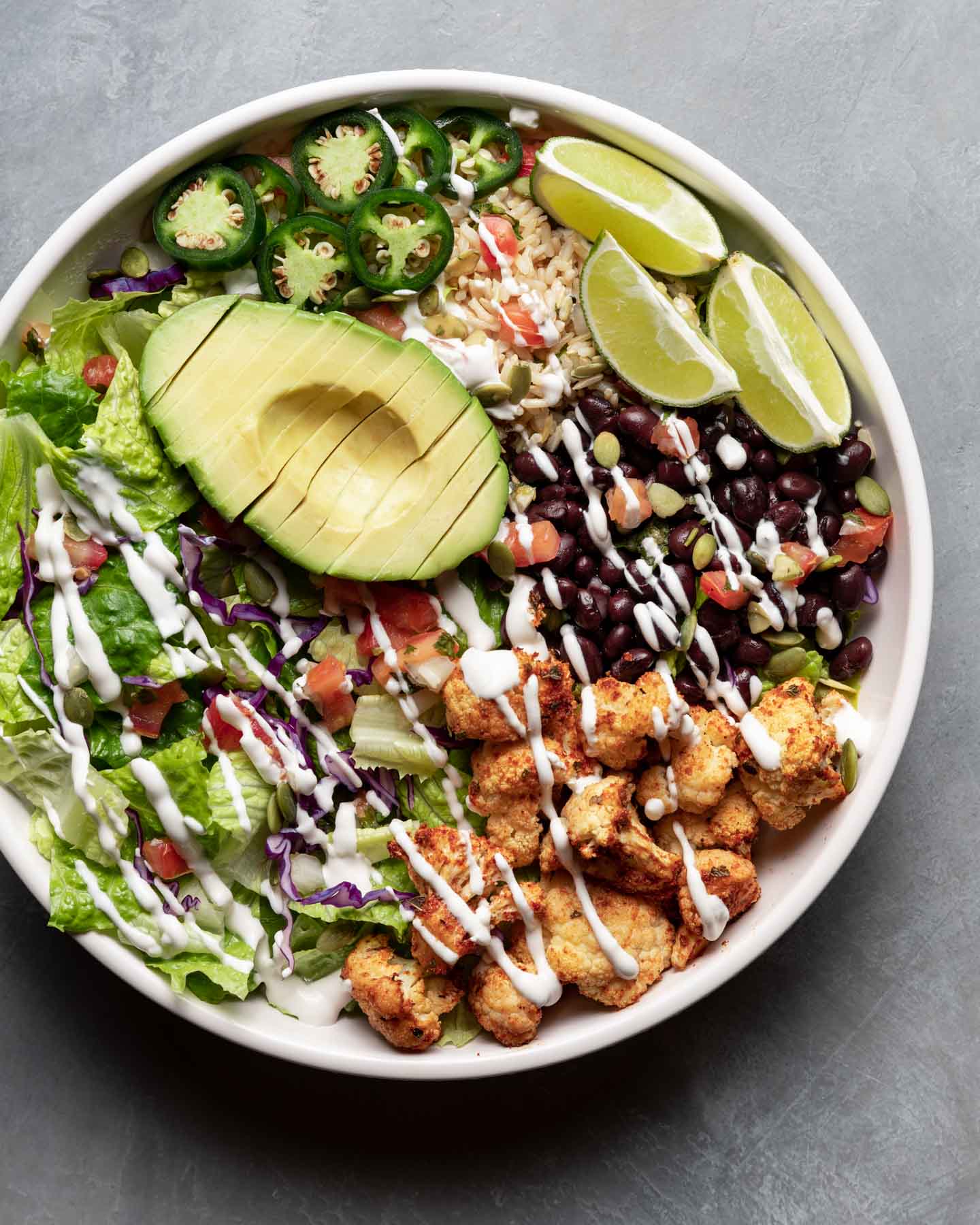 vegan-mexican-bowl-with-spicy-roasted-cauliflower-sprouts-and-krauts