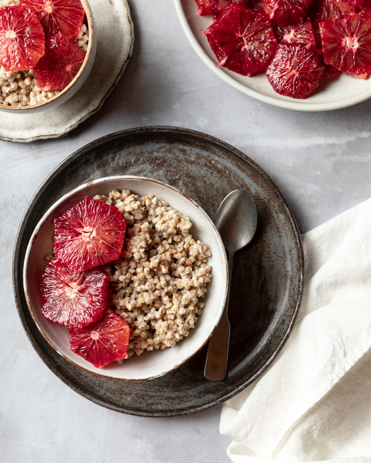 Buckwheat that's been quickly simmered in coconut milk and maple syrup is topped off with slices of blood oranges to make a quick and hearty breakfast.