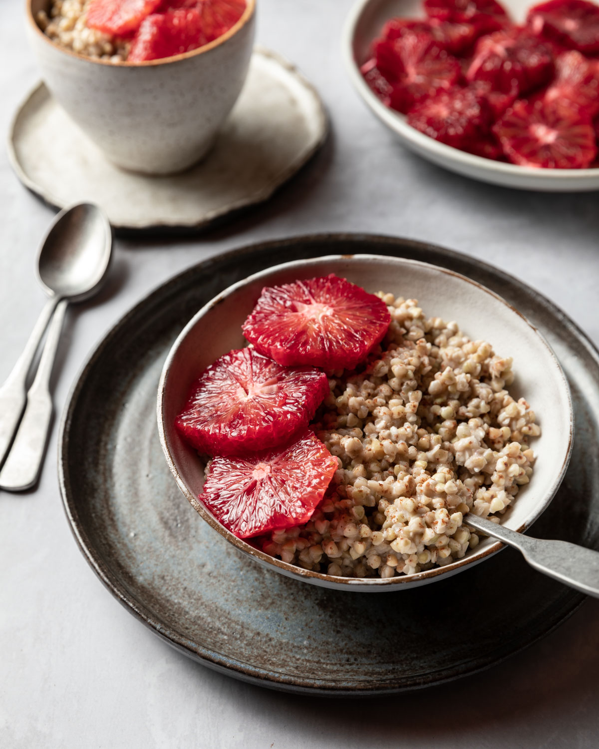 Buckwheat that's been quickly simmered in coconut milk and maple syrup is topped off with slices of blood oranges to make a quick and hearty breakfast.